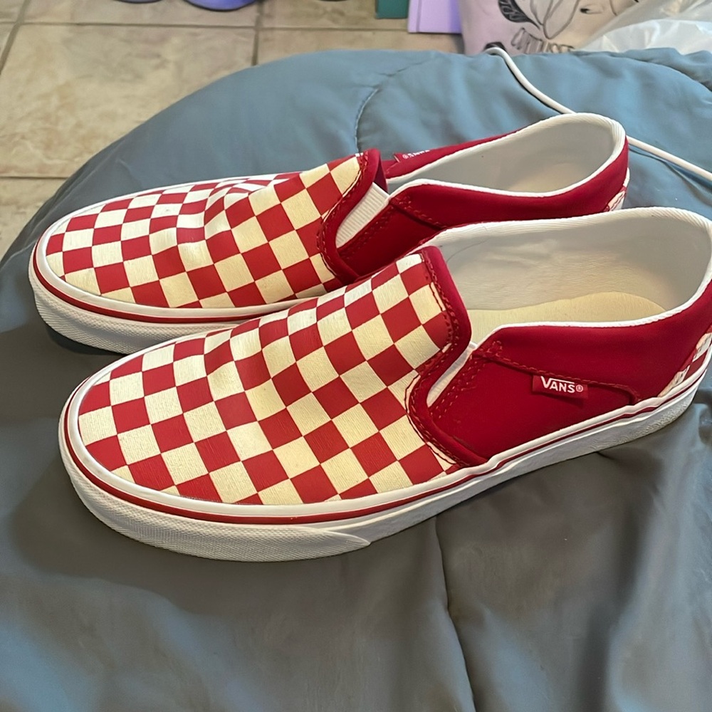 White and red Vans.